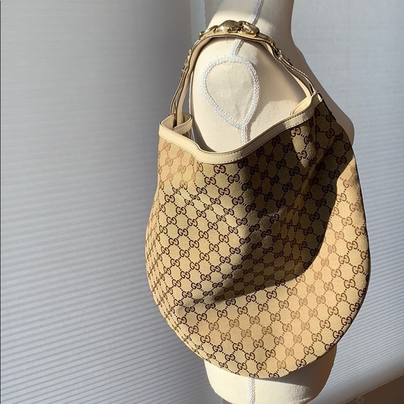 Gucci Handbags - Authentic Gucci Beige GG Fabric Large Wave Hobo